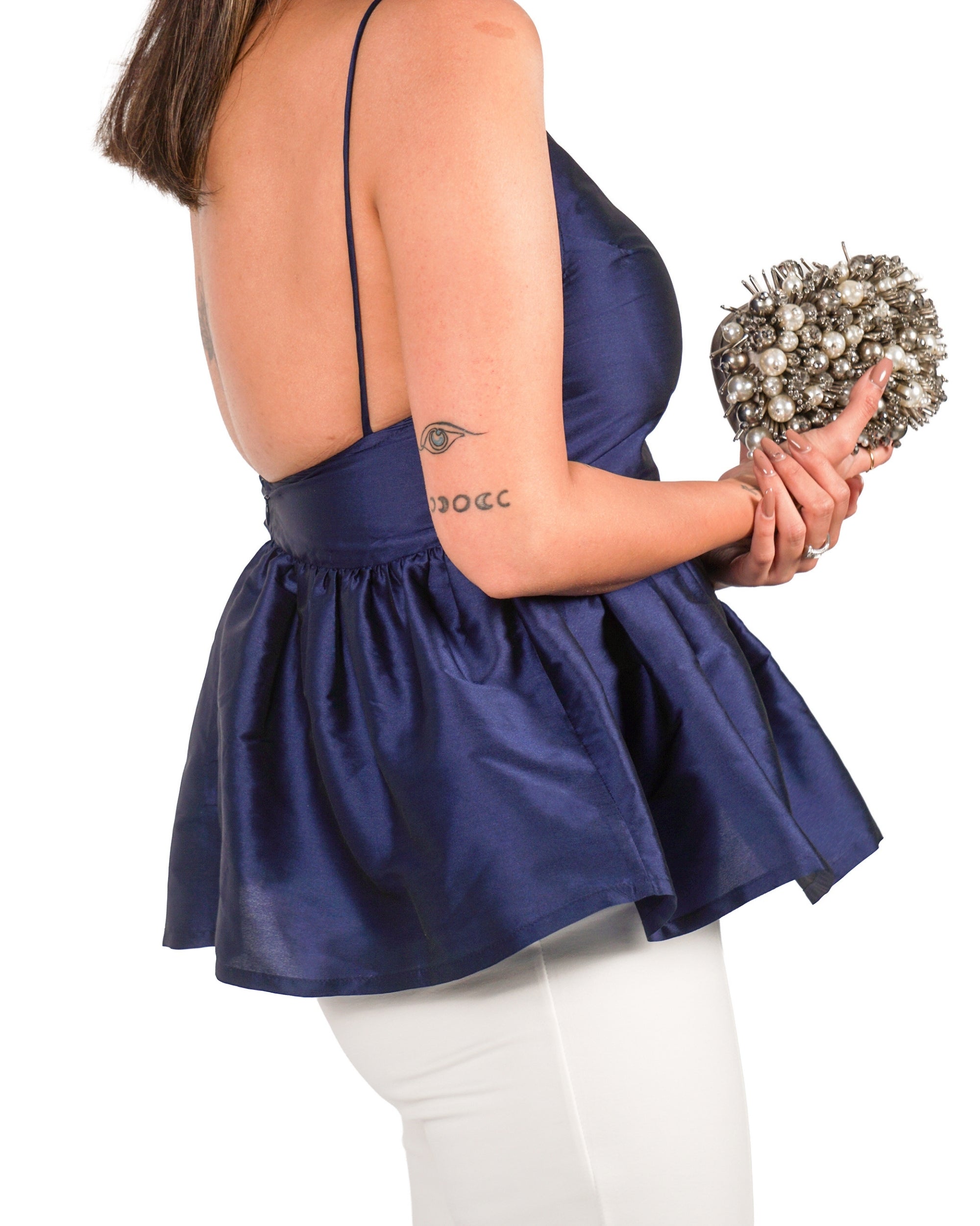 Blue taffeta peplum top with thin straps backless and flared silhouette