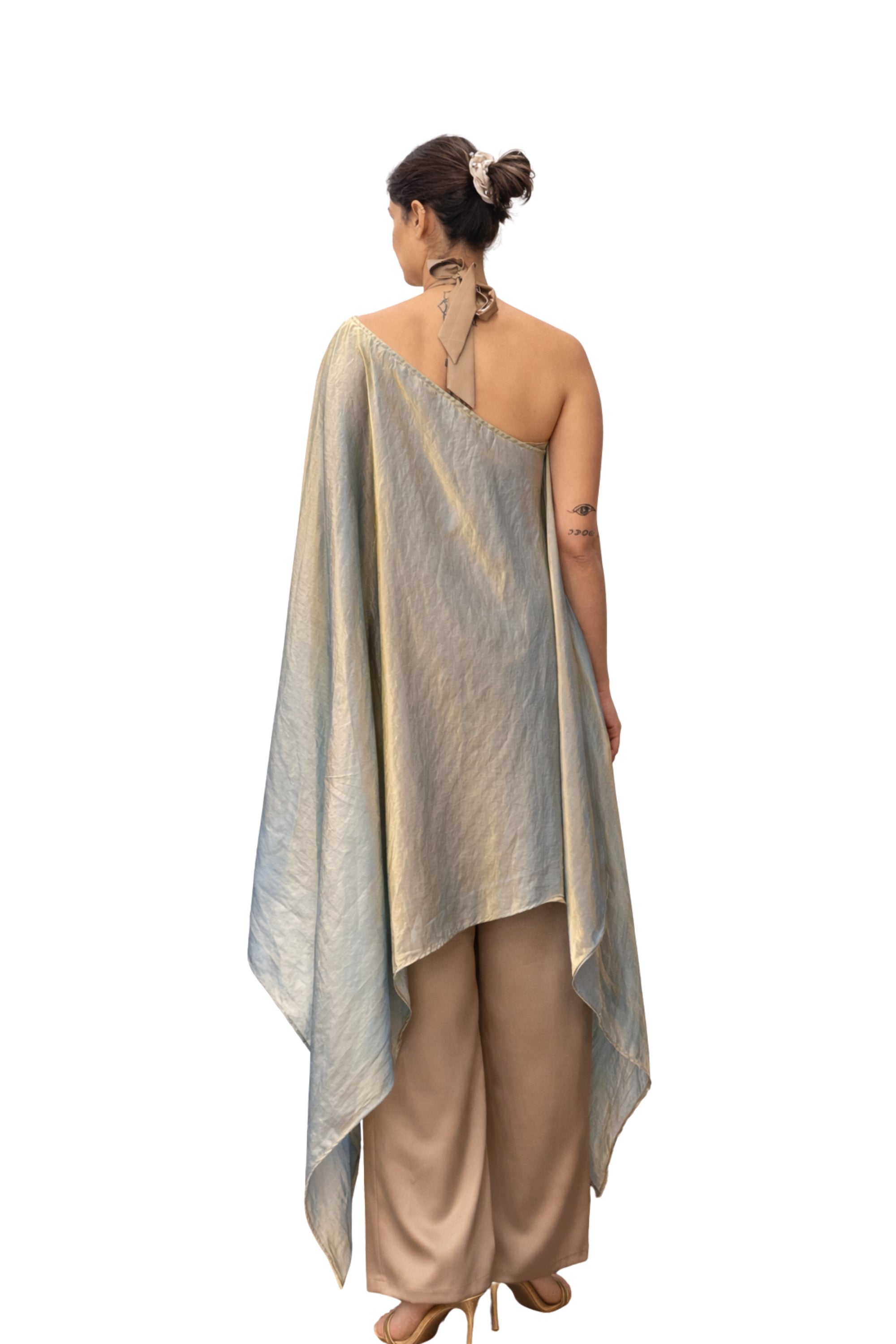gold organza draped top styled with wide leg pants modern womenswear