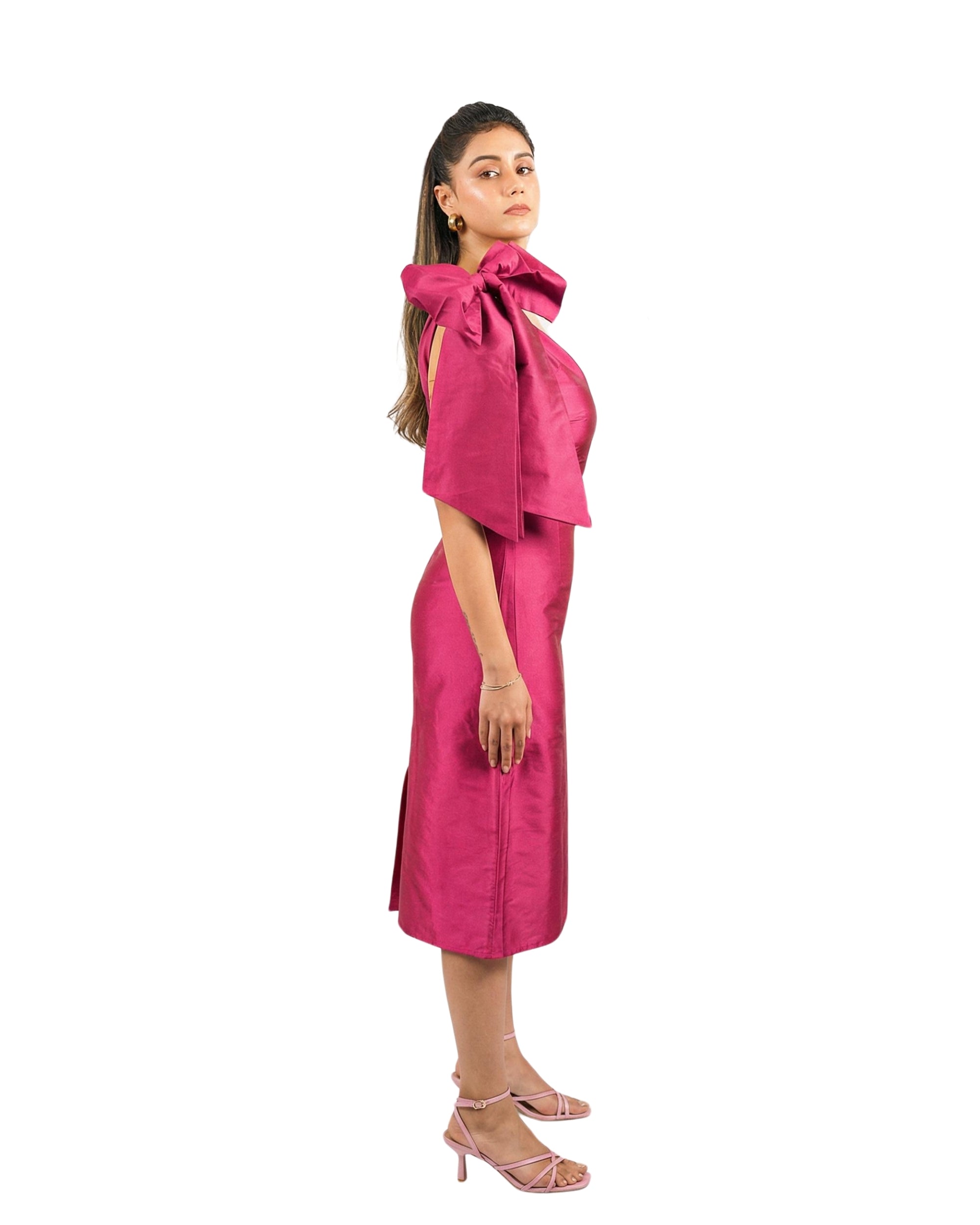 Fuchsia tafetta one shoulder dress with oversized bow and structured silhouette for women