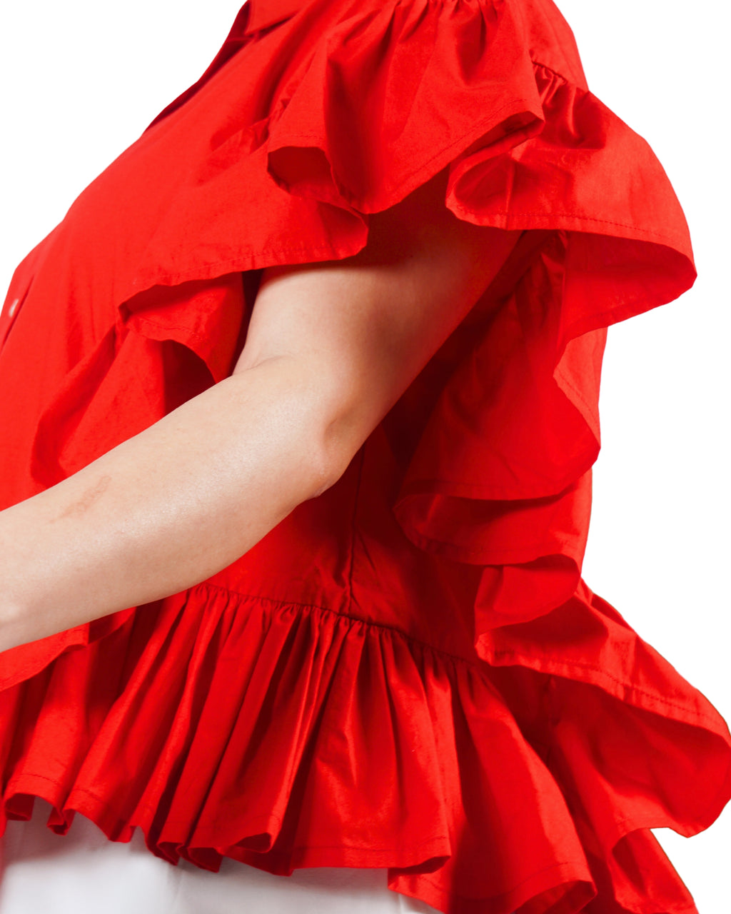 Red button-down shirt with statement ruffle detailing and voluminous silhouette 